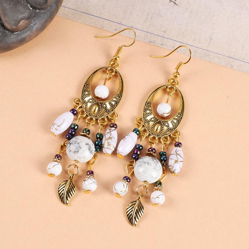 

Экзотические серьги с золотой бахромой в ретро этническом стиле с богемным темпераментом, серьги с чувством стиля, длинные серьги женские