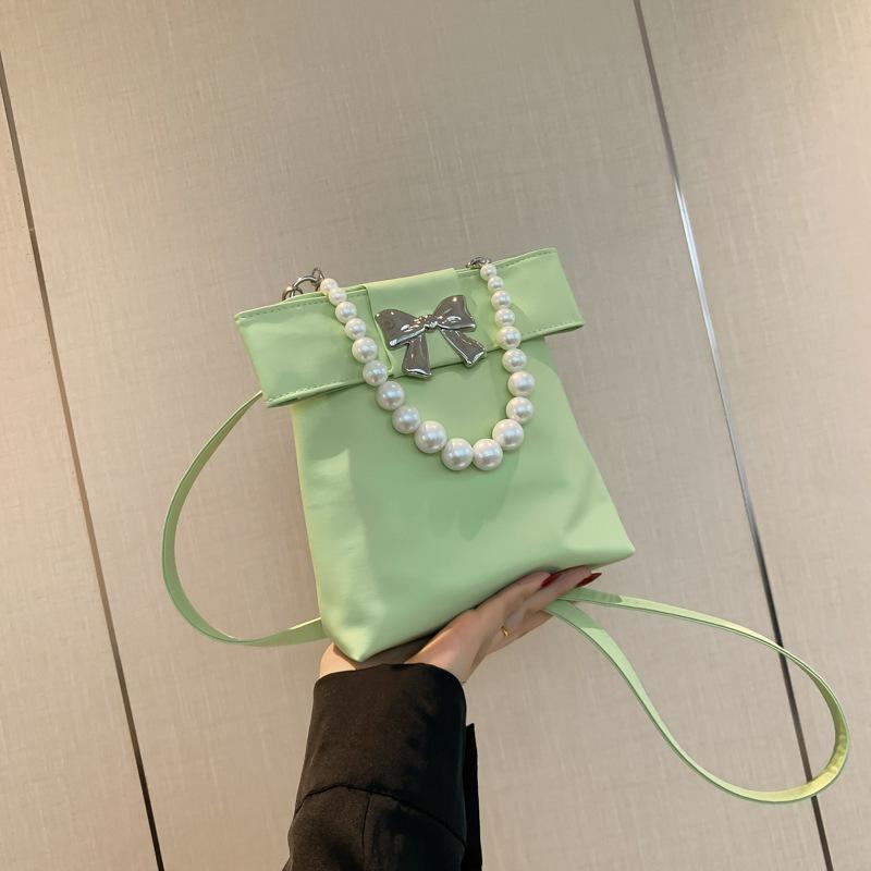 

Сладкая цепочка из жемчуга, сумка-мешок для женщин, новая коллекция 2025, сумка через плечо, сумка-мессенджер, высокая ценность, портативная сумка-ведро с бантом зелёный