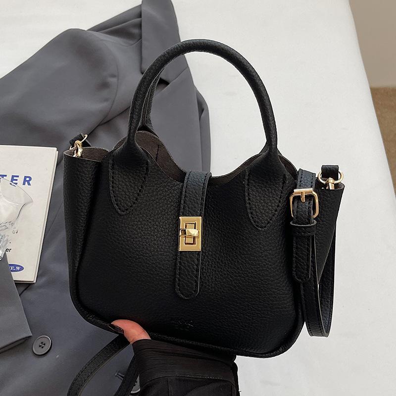 Wholesale hot sale simple temperament light luxury lychee pattern portable bucket bag niche design versatile commuter messenger bag