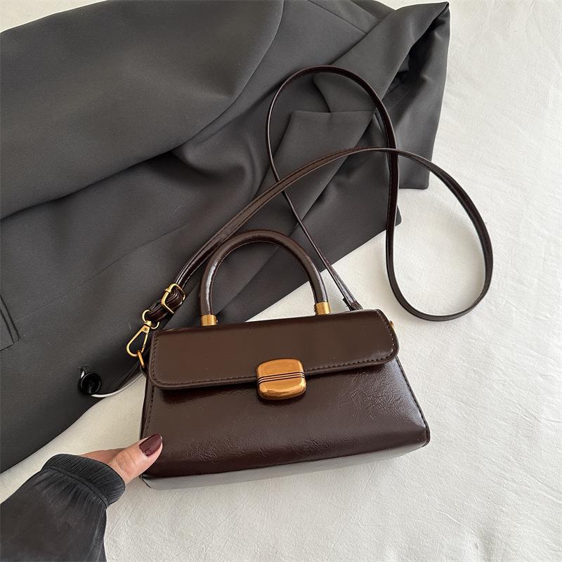 

Сумка в корейском стиле - Весенняя мода 2025, клапан с замком, однотонная сумка кроссбоди темно-коричневого