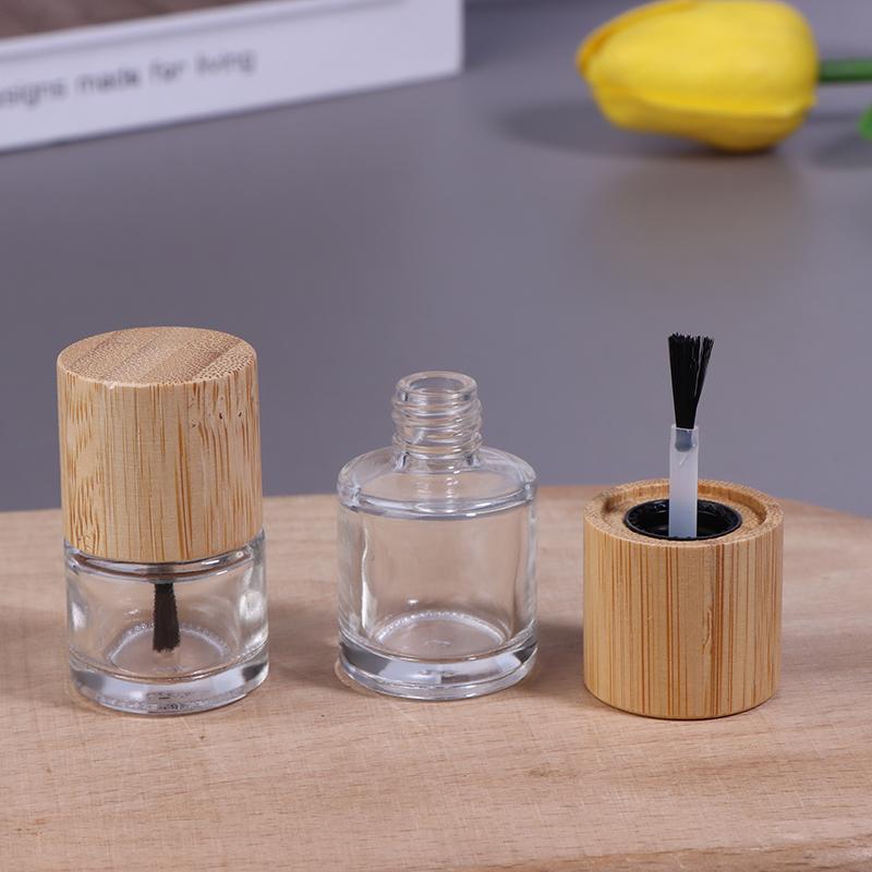 Cylindrical Glass Nail Oil Bottles with Solid Wood and Bamboo Caps – Available In 5ml, 10ml, and 15ml Capacities
