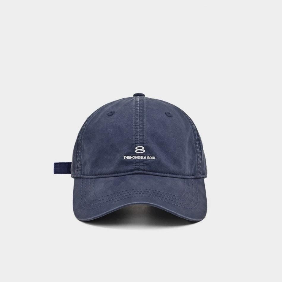 

Street Minimalist Embroidered Small Letter Washed Cotton Baseball Cap To Show Off The Face of A Young Couple on A Trip. Curved Brim Baseball Cap Adjustable