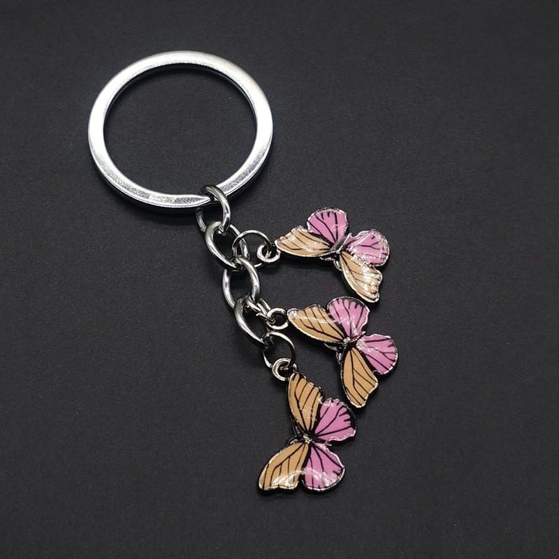 5 colori casuali Nuovi Portachiavi Colorati Smaltati a Forma di Farfalla Insetti Chiave Auto Accessori Borsa Donna Gioielli Regali