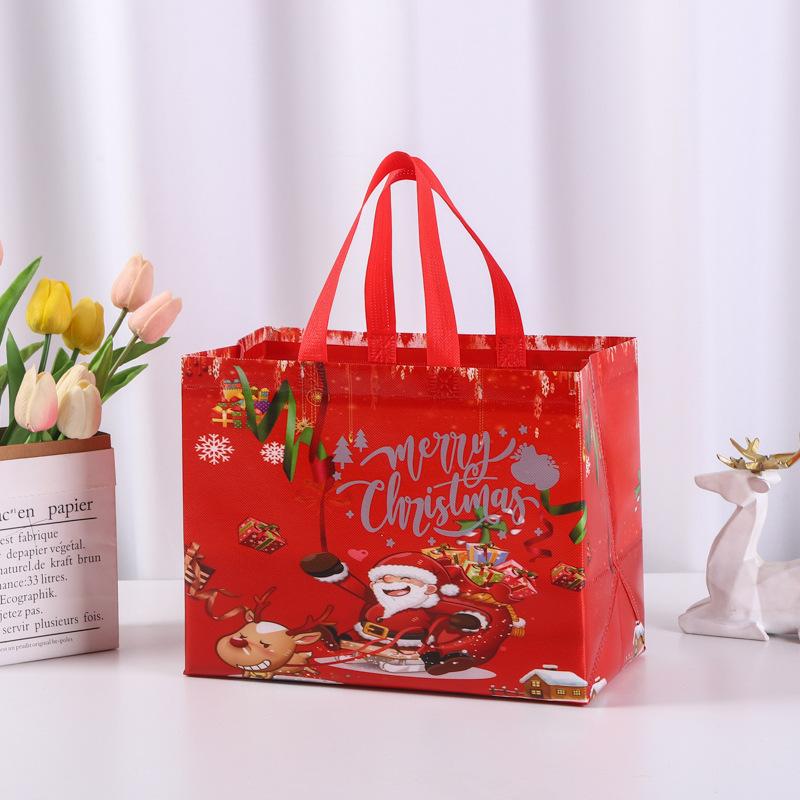 1pcs Christmas Gift Bag Santa Claus Non-woven Candy Gift Packaging Tote Bag Christmas Party Supplies Happy New Year