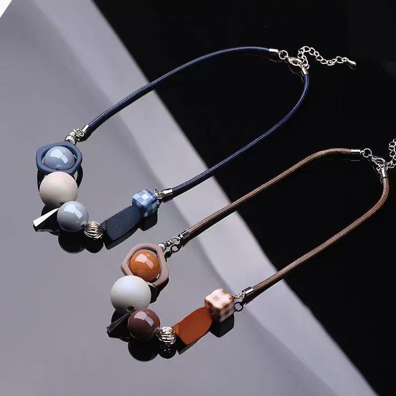 New decorative items clothing necklaces accessories women's personality short sweaters chain locks bone chains color blocked bead necklaces