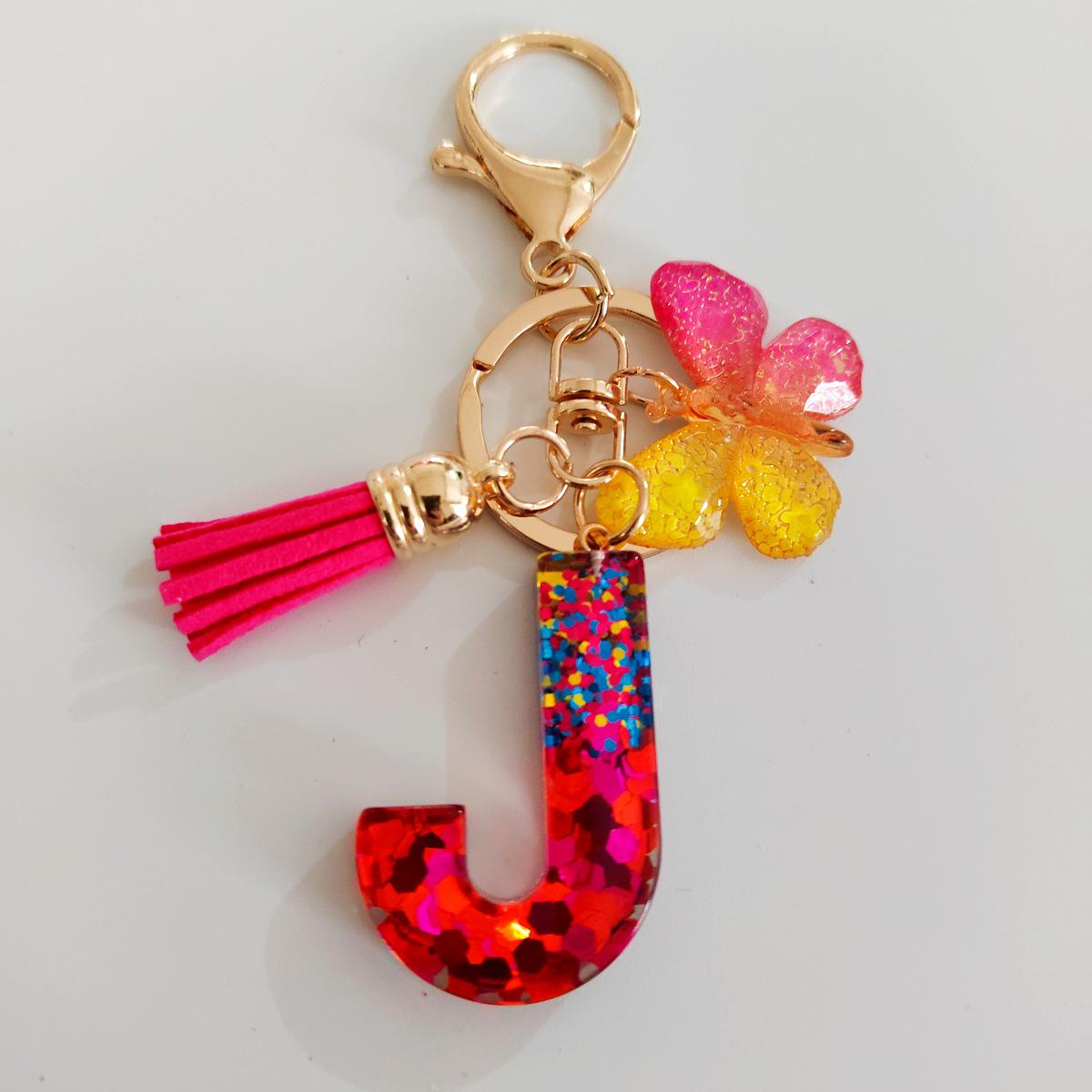 Mixed Color Alphabet Resin Drip Keychain with Butterfly Tassel Pendant