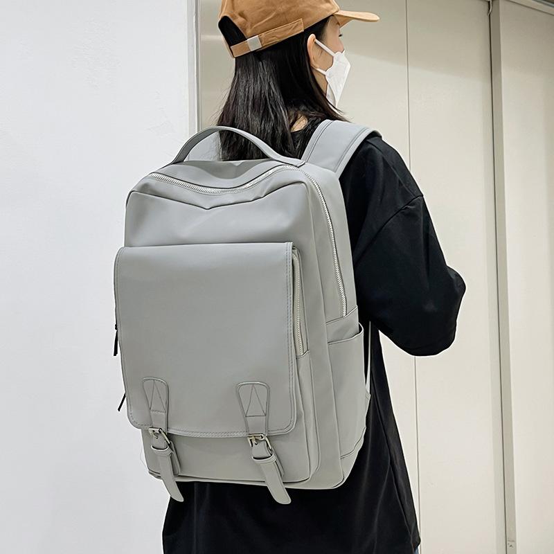 

Новий корейський модний чоловічий рюкзак 2024 р. Студентський рюкзак із пряжкою для подорожей сірий колір