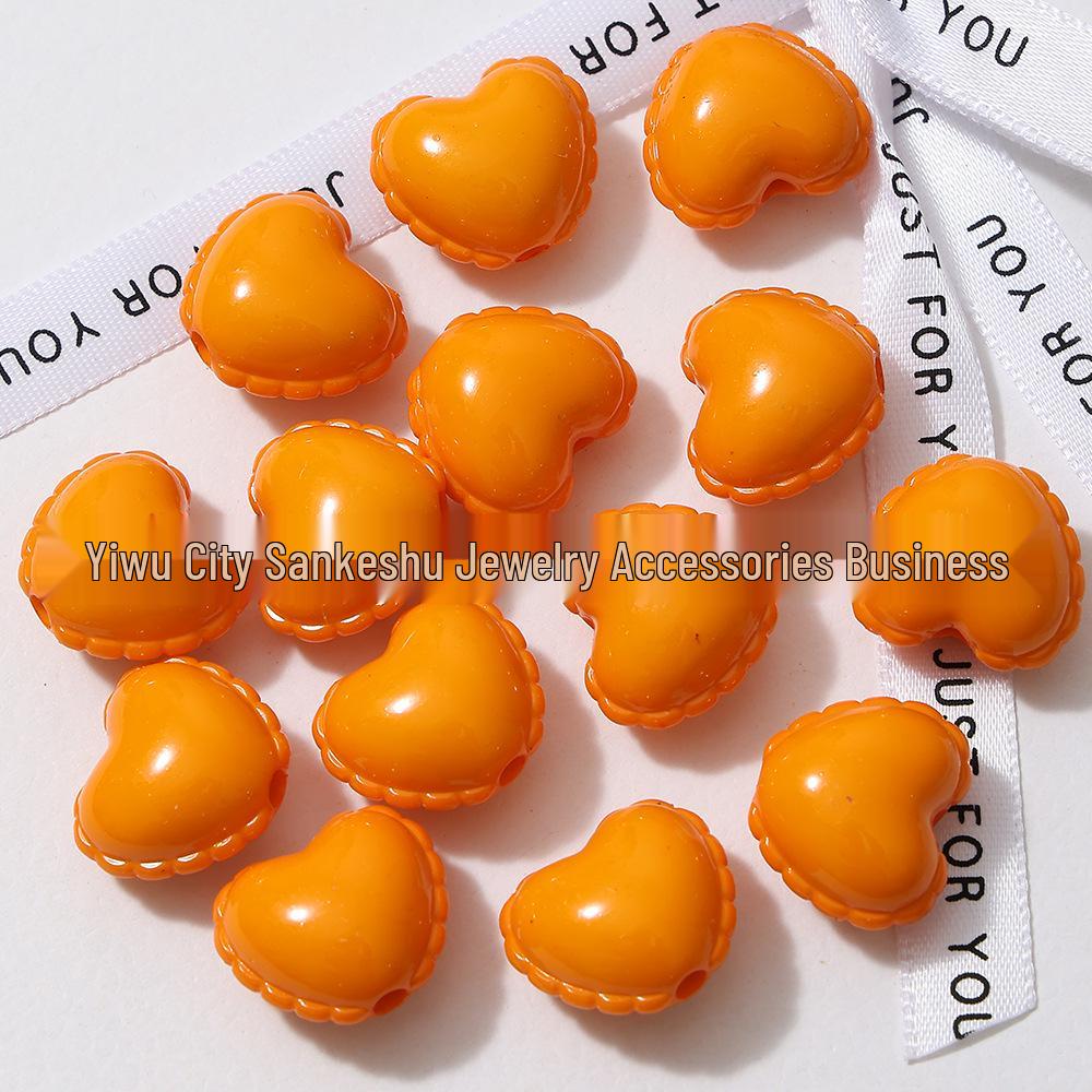 Acrylic Peach Heart Skirt Trim: Glossy Beaded Phone Charm