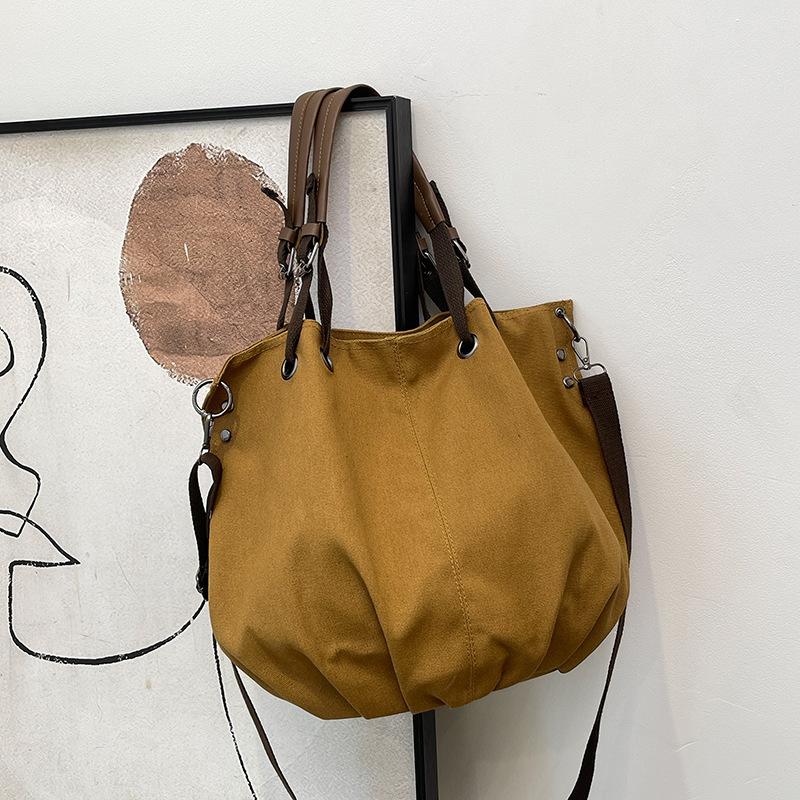 

Модна сумочка Нова жіноча одноколірна сумка в стилі ретро Велика місткість Європейська та американська сумка через плече Жіноча сумка для приміських поїздок хакі