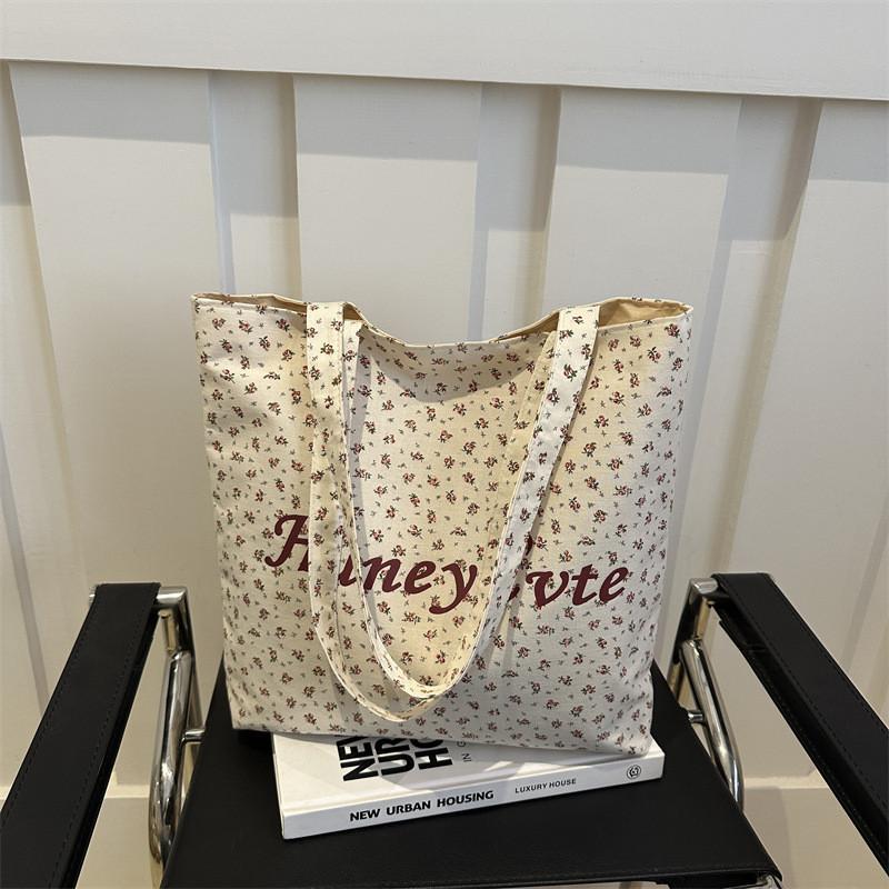 Fashionable Blue Floral Canvas Tote Bag With Stylish Stitching Details розовый