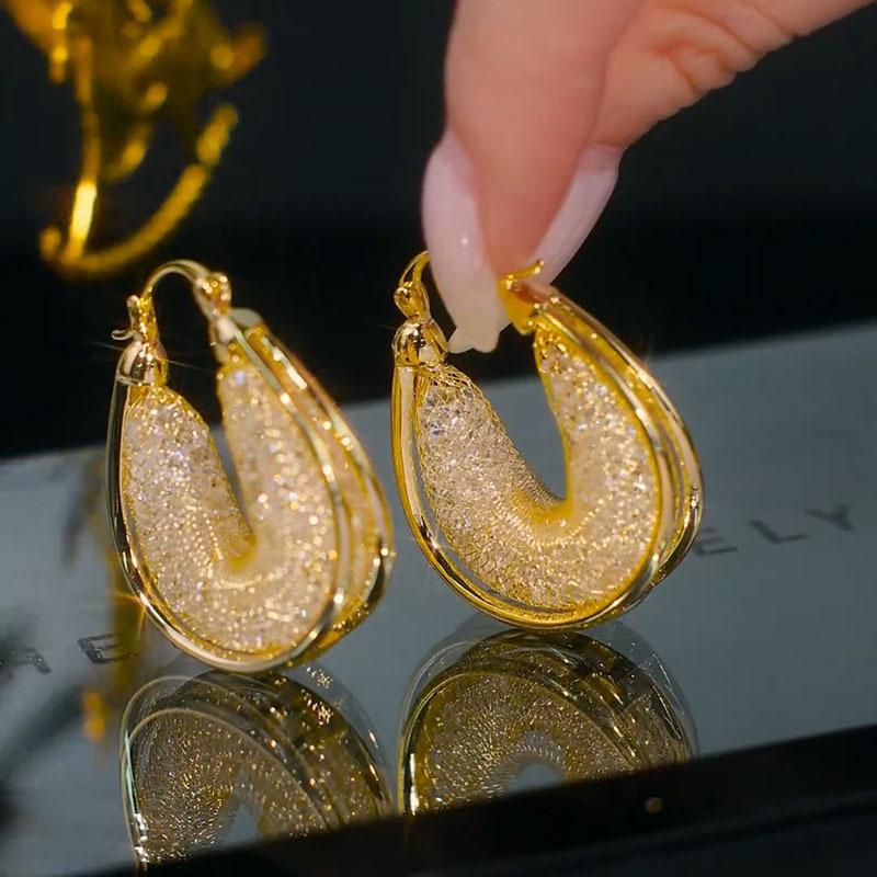 European and American exaggerated light luxury mesh earrings and ear buckles, temperament, personality, exquisite super flash zircon earrings for