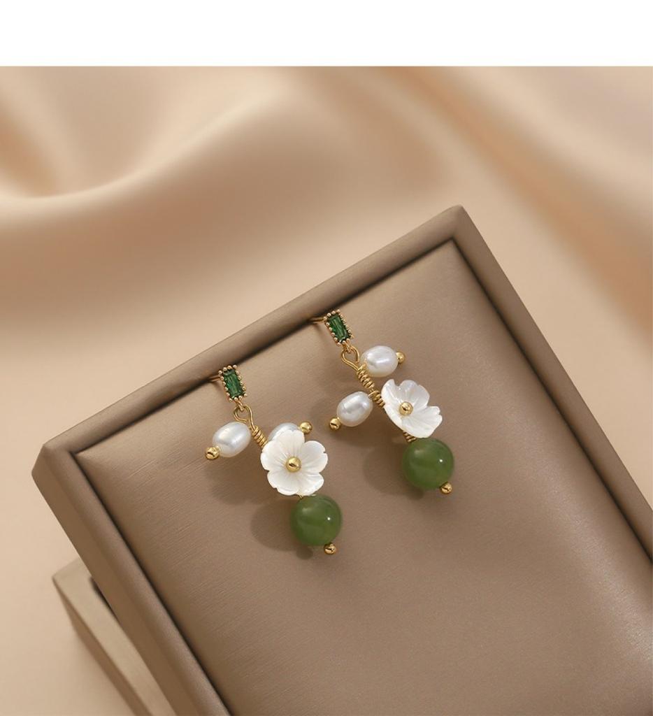 Gentle and elegant natural Hetian jade flower earrings women's handmade winding pearl stud earrings S925 silver needle niche temperament