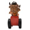 Country Living Highland Cow on Tractor