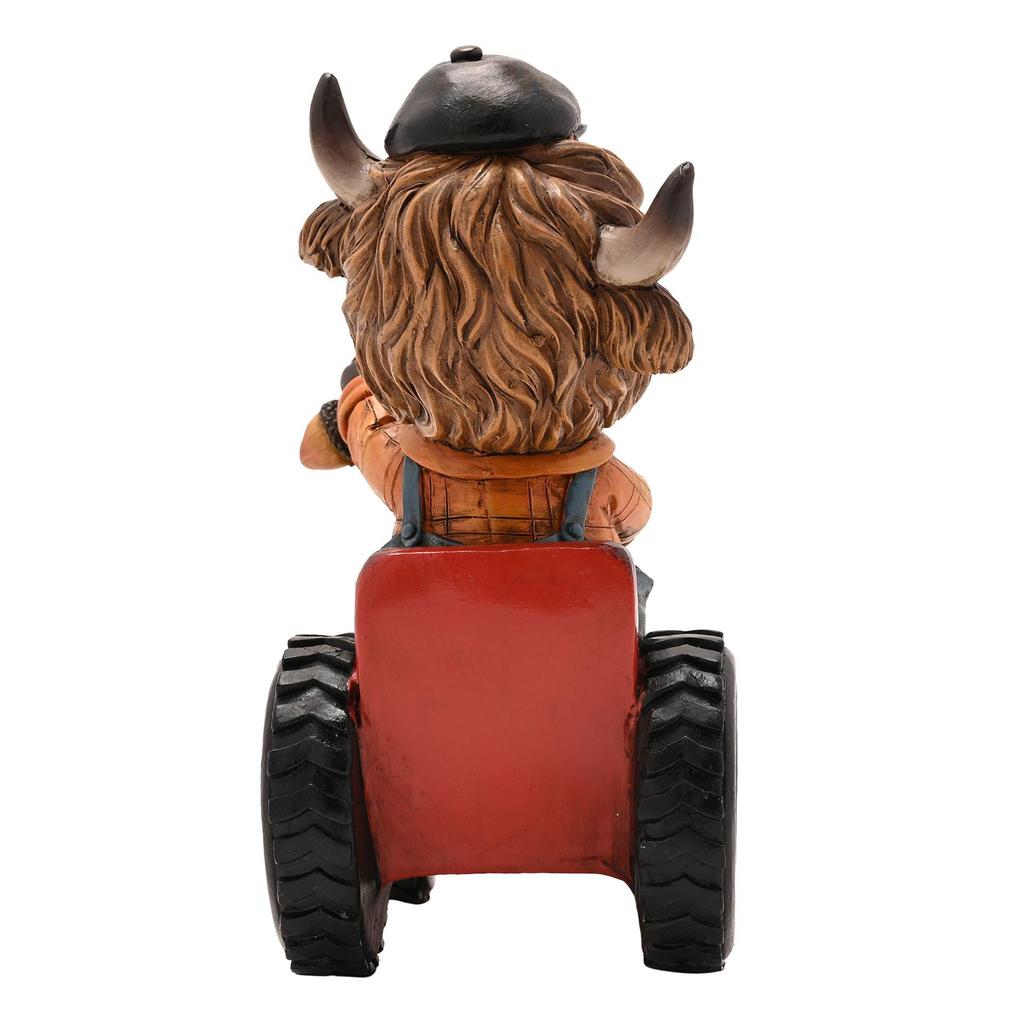 Country Living Highland Cow on Tractor