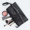Stylish large makeup brush bag with transparent breathable mesh for portable storage.