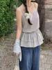 It has been warehoused and purchased, the new Korean version of the plaid drawstring versatile suspender top for women.