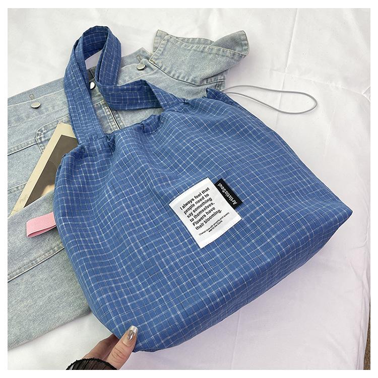 

Летняя повседневная двусторонняя клетчатая холщовая сумка-тоут 2025 новая корейская версия легкая и универсальная вместительная женская сумка