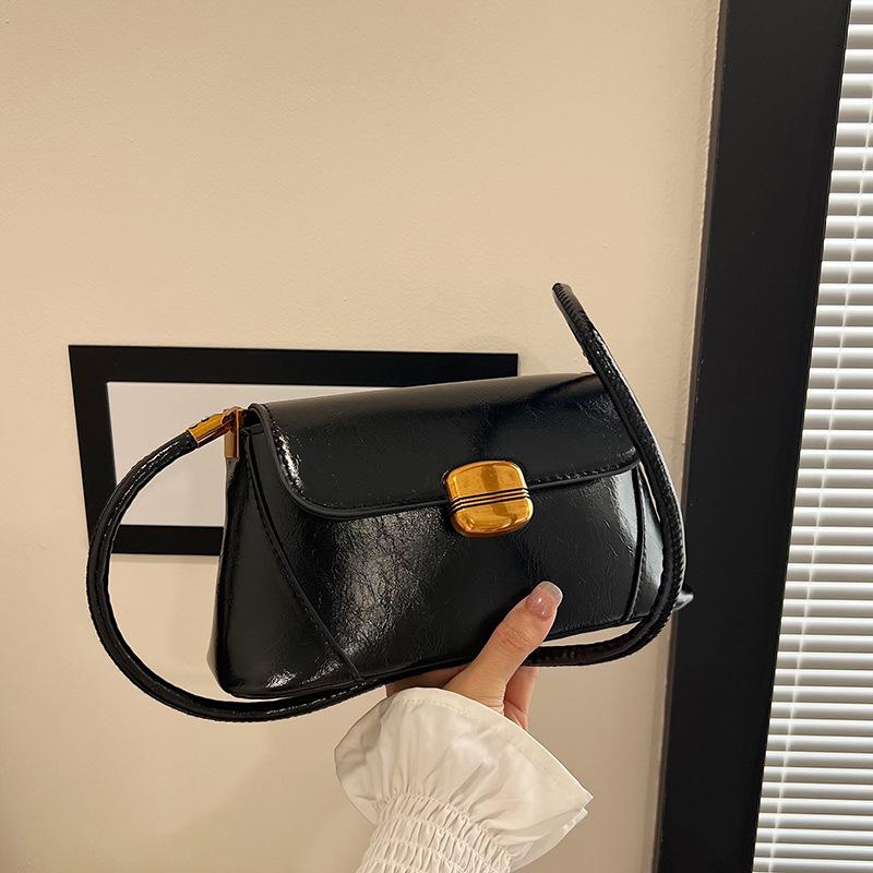 

Премиальный сенс универсальный зарубежный стиль французская сумка подмышку женская мода жирная кожа новый темперамент для поездок на работу повседневная на плечо чёрный