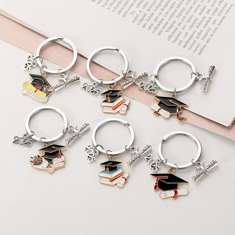 2/10 Pièces Porte-clés Cérémonie de Remise de Diplômes Mignon Créatif Chapeau de Diplômé Livre Robe Pendentif Porte-clés Cadeau Commémoratif Cérémonie de Remise de Diplômes