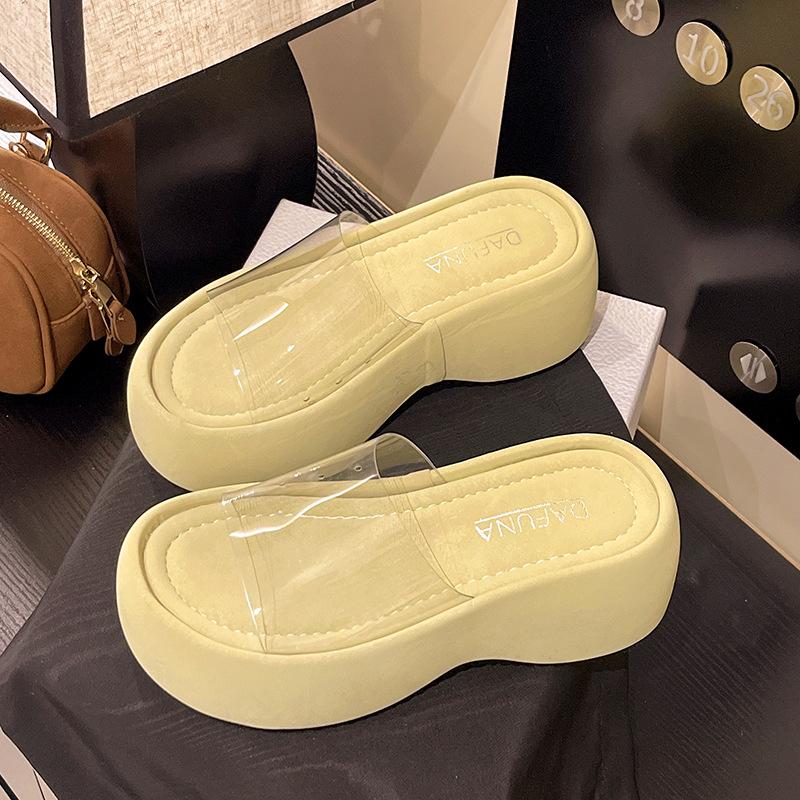 In the Summer of 2025, the New One-word Transparent Open-toed Muffin with Thick Bottom Waterproof Table Slope Heel and Cool Slippers.
