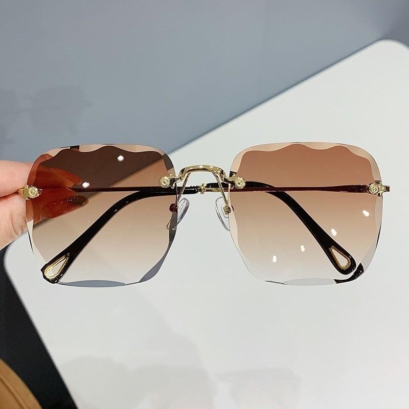 Women Rimless Sunglasses Ocean Lens Irregular Frame UV Protection