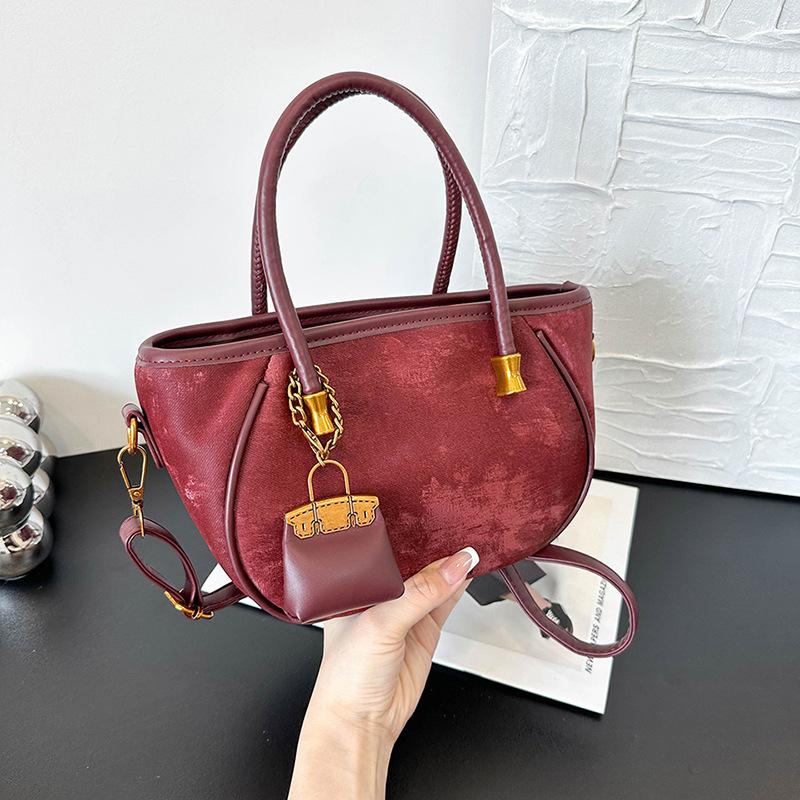 Niche design retro handbag women's new fashion versatile shoulder messenger bag bucket bag
