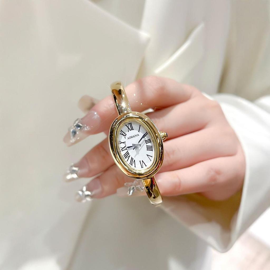 AIMANA Women's Oval Quartz Bracelet Watch: Small Dial, Roman Numerals, Light Luxury Style.