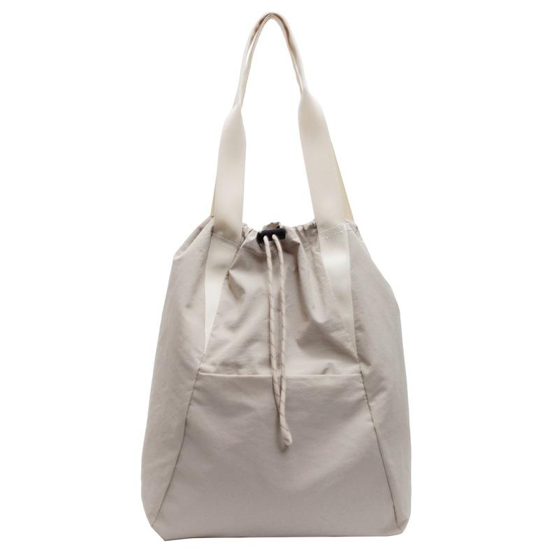 

New nylon travel backpack casual drawstring bundle large capacity backpack multi-function shoulder messenger bag