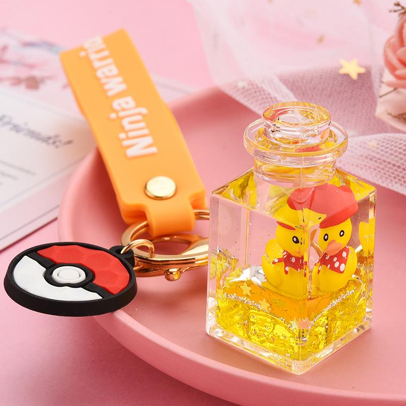 Creative Quicksand Little Yellow Duck Dinosaur Perfume Bottle Backpack Pendant Acrylic Accessory