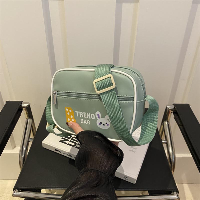 

Popular new versatile cute rabbit printed messenger bag female trend leisure students go shopping autumn and winter trend зелёный