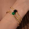 Elegante bracciale rigido aperto in acciaio al titanio e pietra naturale per donna