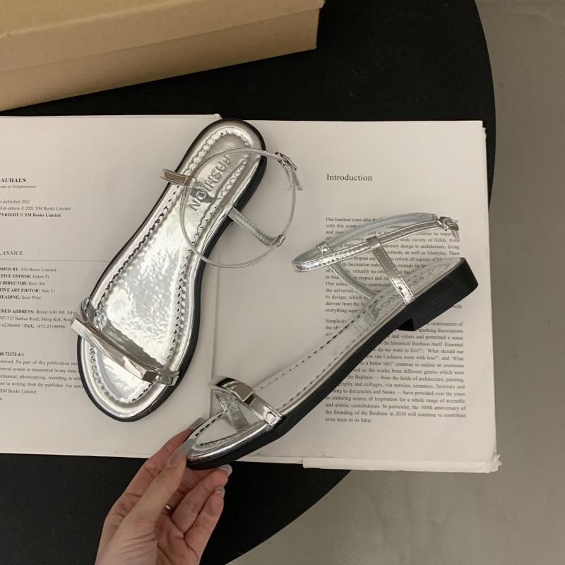 

French beautiful evening breeze with silver sandals women s 2025 new skirt high-end flat Roman shoes 40 серебряный