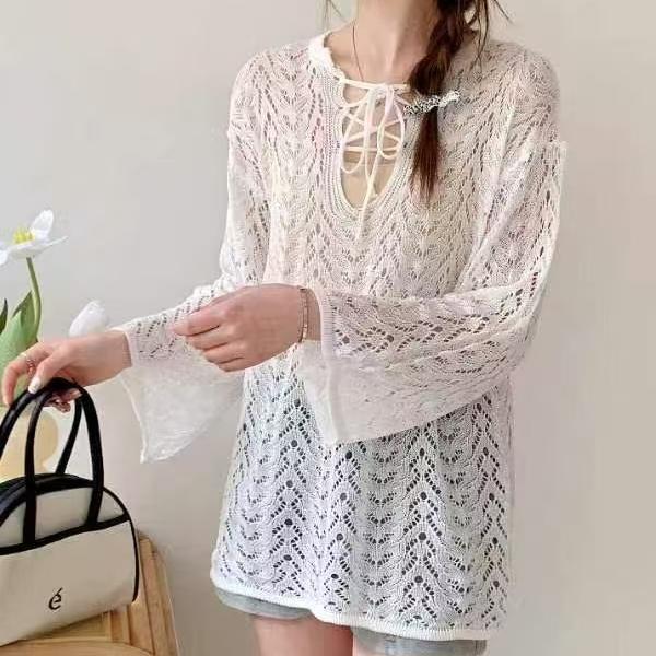 

Summer atmosphere crochet hollow sunscreen knitted sweater women loose and thin lace-up blouse long-sleeved top thin women Average size 53-204 білий