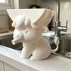Cow-shaped sponge holder drains water via mouth. Cute sink organizer for kitchen & bathroom; sponge excluded.