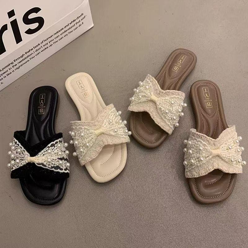 Foreign-style Small Fragrant Wind One-word Drag Girl 2025 Summer New Flat-bottomed Pearl Cool Slippers Outer Wear Fairy Beach Explosion