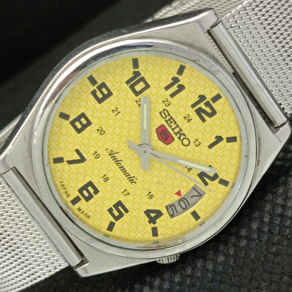 

USED VINTAGE SEIKO 5 AUTOMATIC 7009A JAPAN MENS DATE YELLOW WATCH 595a-a312308-9 SKU595a-a312308