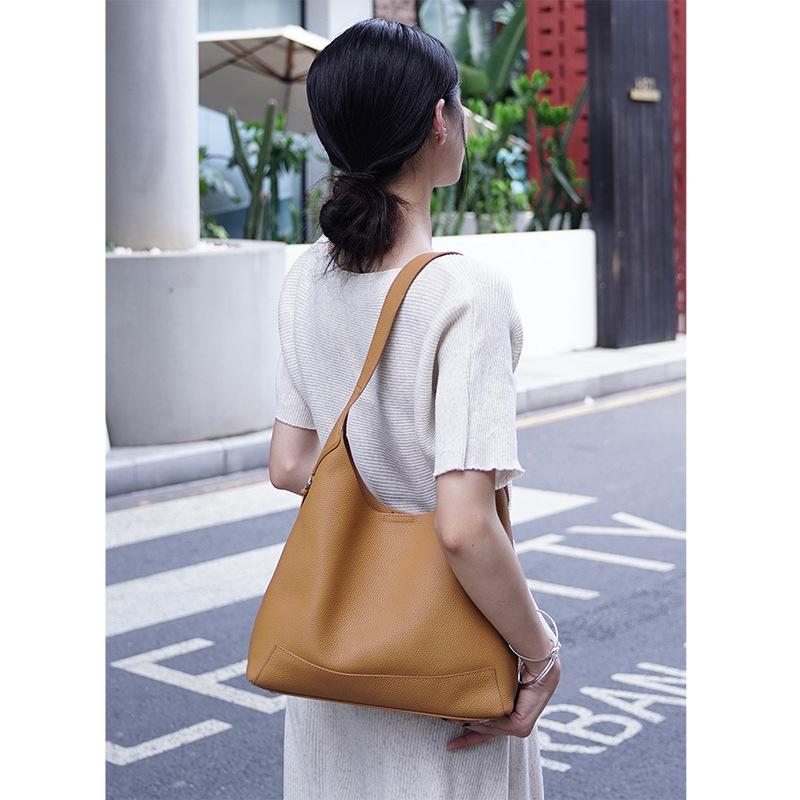 Exquisite new high-end commuter shoulder bag, simple bucket bag, casual large-capacity crossbody bag