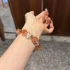 Natural white crystal red agate bracelet for women, high-end black gold super seven exquisite fashion bracelet, original niche design