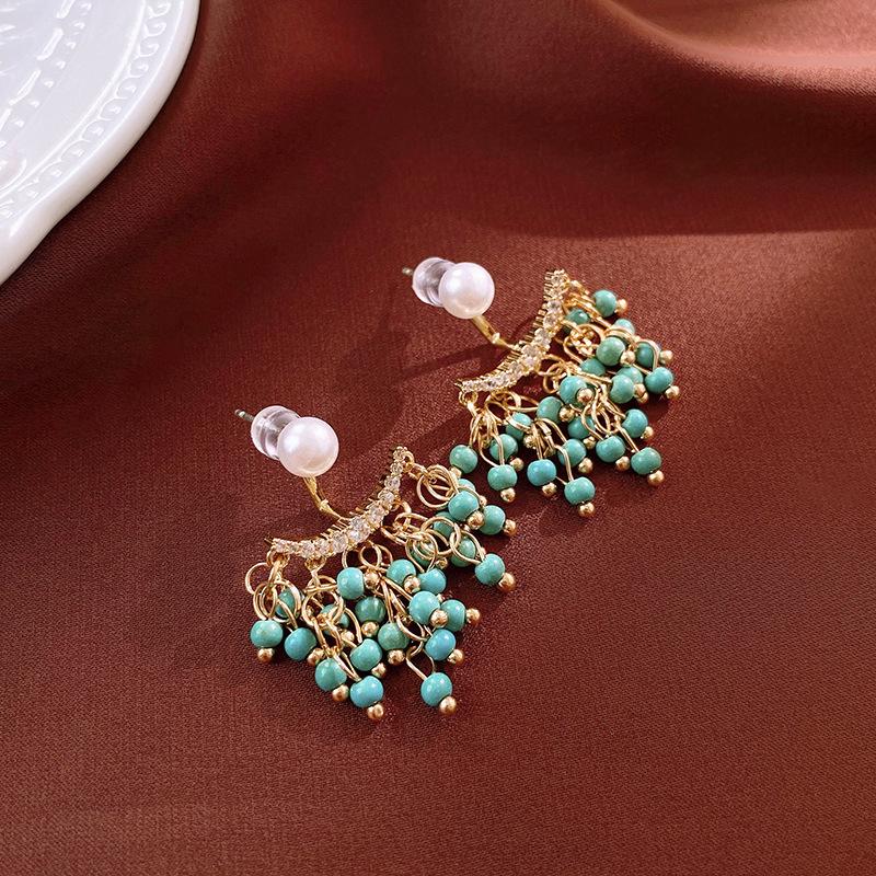 

Vintage Ethnic Tassel Earrings with Diamond and Turquoise Imitation – Versatile, High-End Back-Hanging Design
