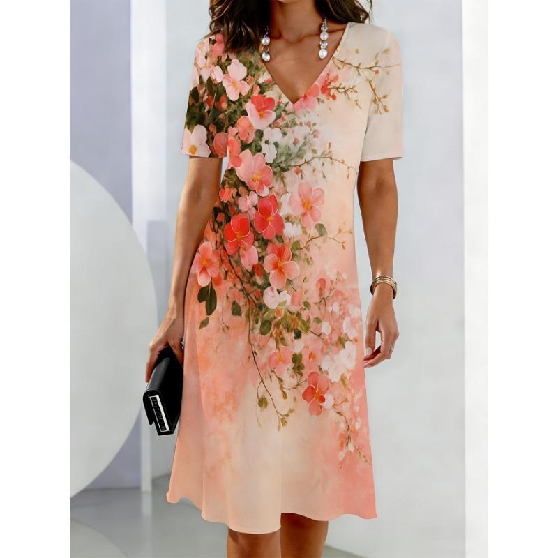 

Peach-Colored Short Sleeve Dress with a Floral Print Featuring Pink And Red Flowers, Perfect for Casual Spring And Summer Outings S