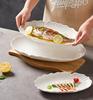 White Porcelain Oval Seafood Plate - High-Temperature Resistant, Ideal for Restaurants and Hotels.
