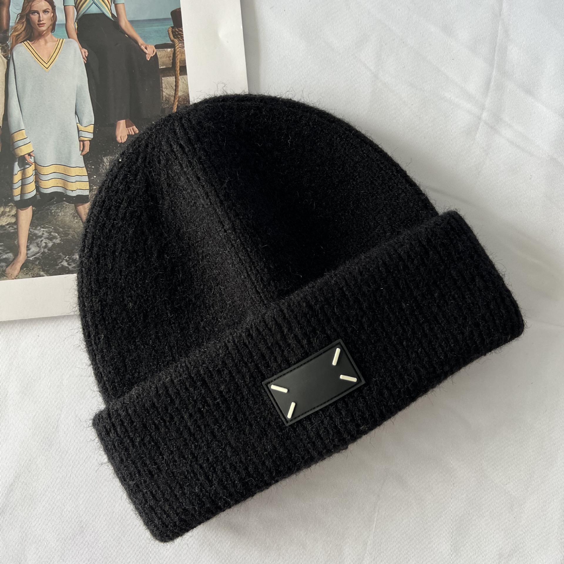 

Winter new thick wool knitted hat warm versatile bag head hat flanged ear protection fashion wool hat women s cold hat 55-59cm чорний