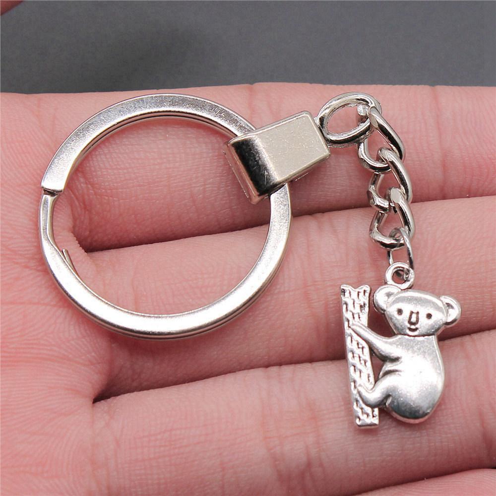 Dinosaur Animal Prehistoric Creature Pendant Antique Bronze Metal Keychain with 30mm Ring for Women High Quality