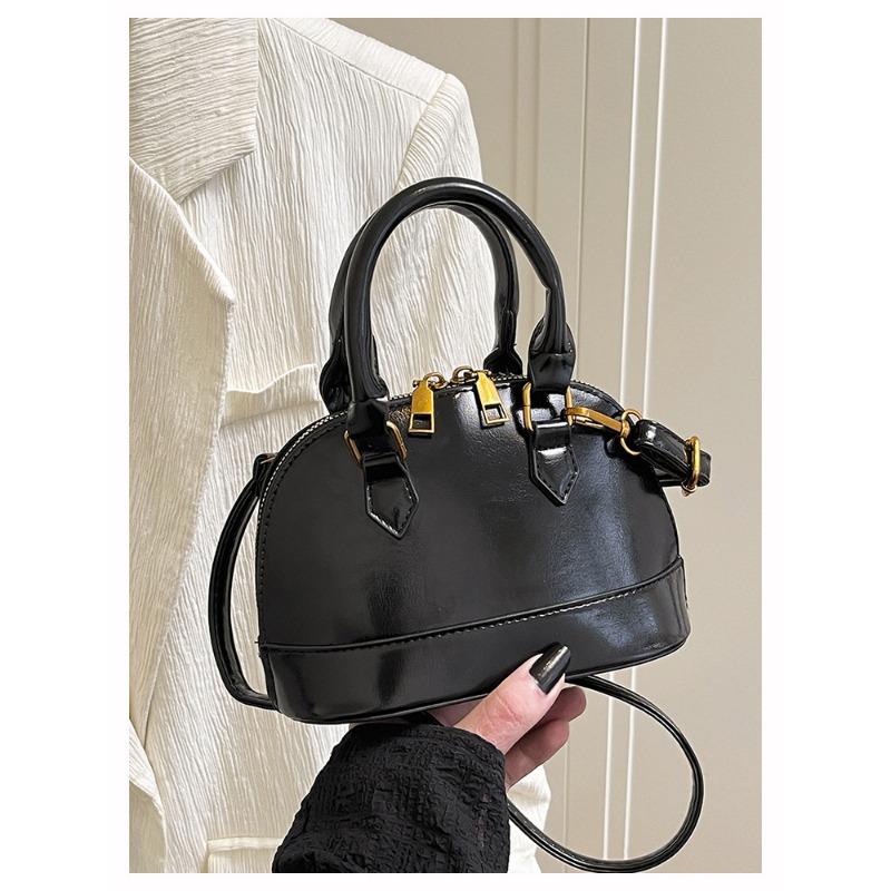 Die Handtasche ist modisch und retro, die Umhängetasche ist stilvoll und die Crossbody-Muscheltasche ist stilvoll