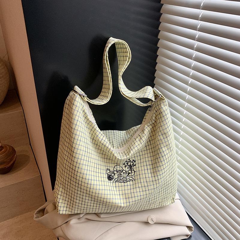 Simple canvas bucket bag women's spring and summer new fashionable versatile plaid large-capacity shoulder bag