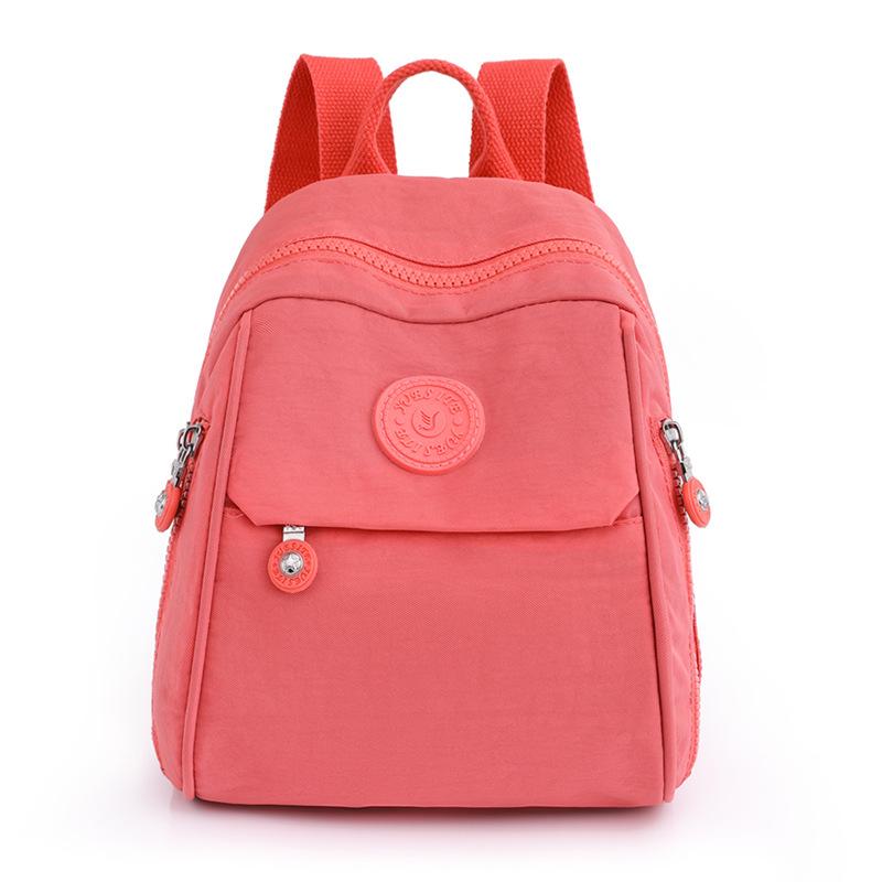 

Women s Sporty Mini Backpack - Lightweight Nylon Multi-Use Shoulder & Chest Bag for Travel.