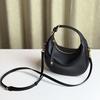 The new crescent-shaped bag, hand-held top layer cowhide women's bag, single-shoulder crossbody genuine leather underarm bag, exudes a sense of luxury