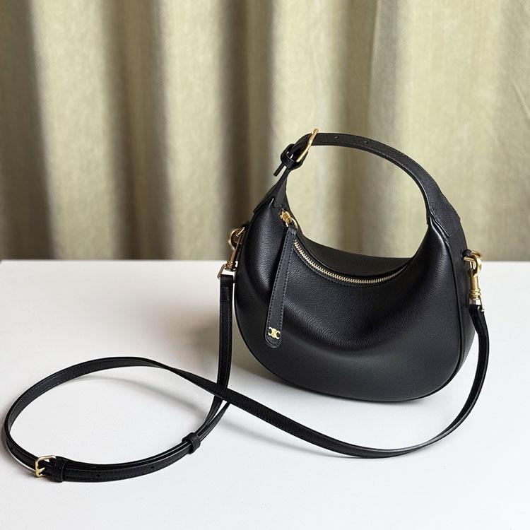 The new crescent-shaped bag, hand-held top layer cowhide women's bag, single-shoulder crossbody genuine leather underarm bag, exudes a sense of luxury