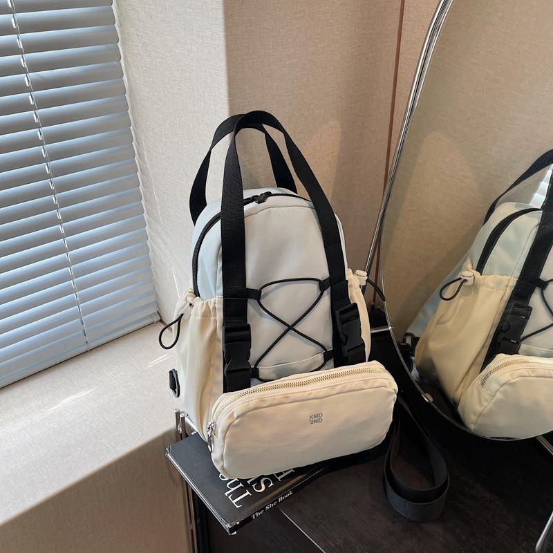 

Backpack bag women s model out shopping fashion portable small backpack casual versatile commuter shoulder messenger bag синій