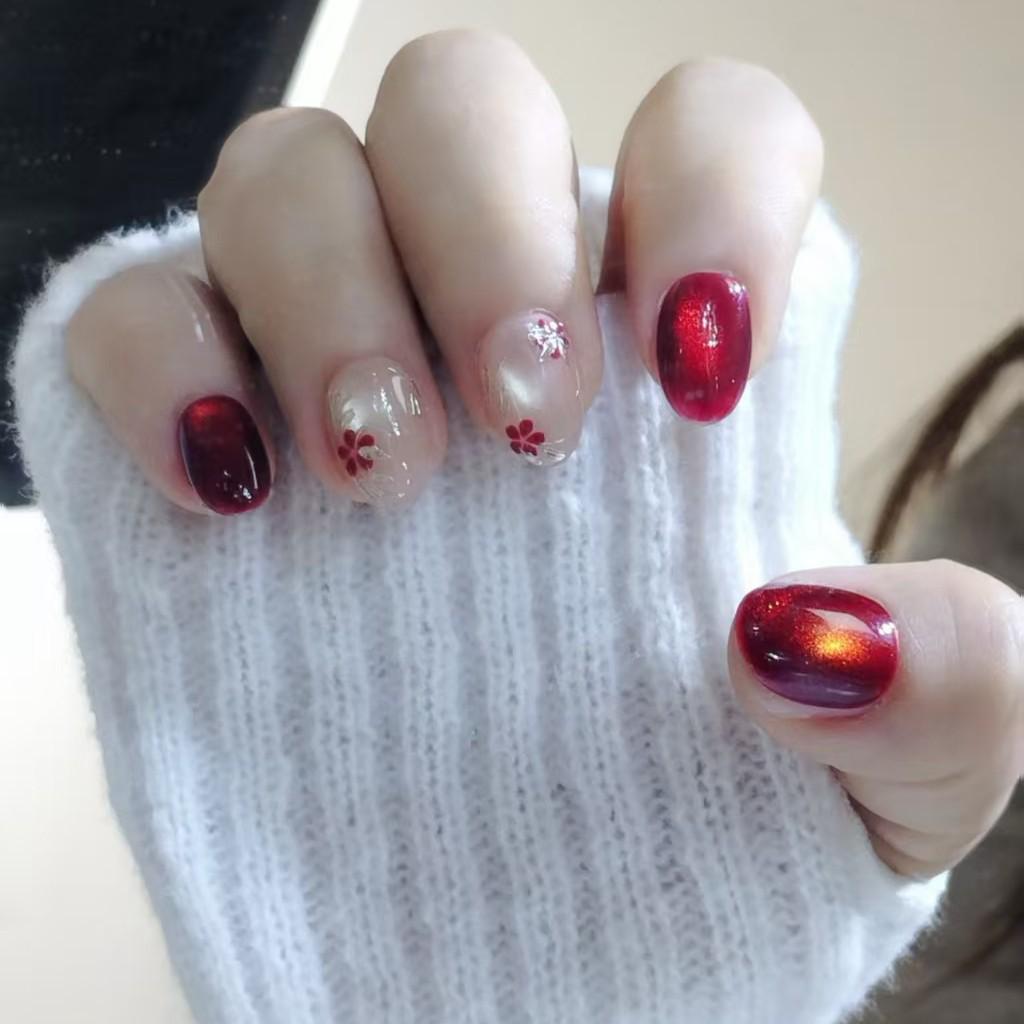New Year Ruby Cat Eye Press-On Nails: Hand-Painted Plum Blossom, Elegant Skin-Whitening Short Nails